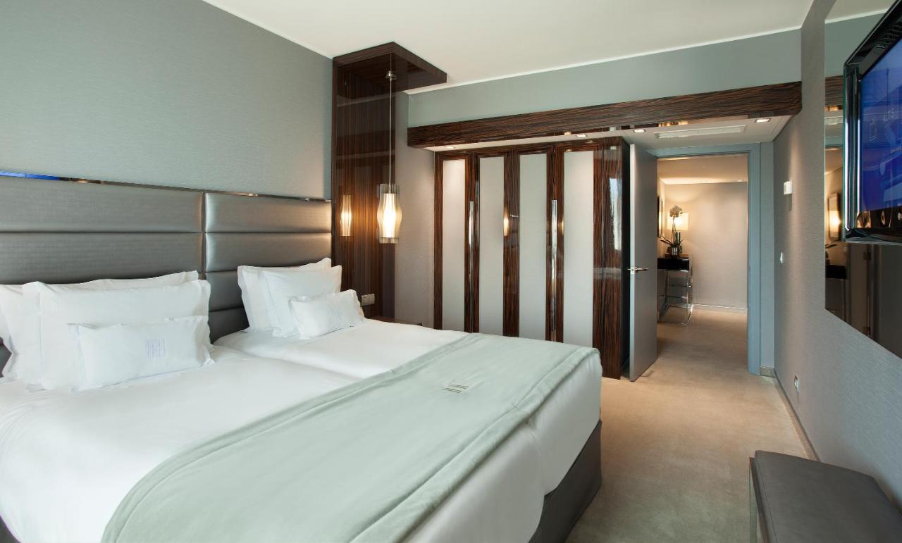 Altis Grand Hotel Lisbon Exterior photo A room at the hotel